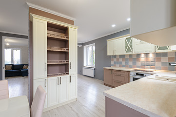 Image showing Luxury modern provence styled grey, pink and cream kitchen interior