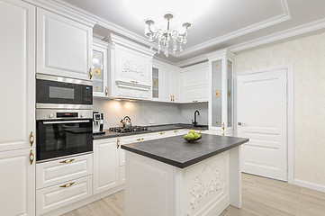 Image showing White luxury modern kitchen with island