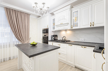 Image showing White luxury modern kitchen with island