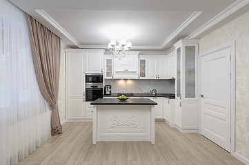 Image showing White luxury modern kitchen with island