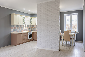 Image showing Luxury modern provence styled grey, pink and cream kitchen interior