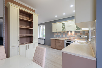 Image showing Luxury modern provence styled grey, pink and cream kitchen interior