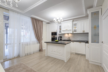 Image showing White luxury modern kitchen with island