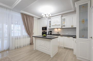 Image showing White luxury modern kitchen with island