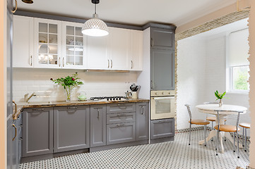 Image showing modern grey and white wooden kitchen interior