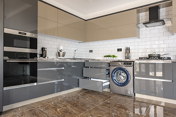 Image showing Luxury modern white, beige and grey kitchen interior