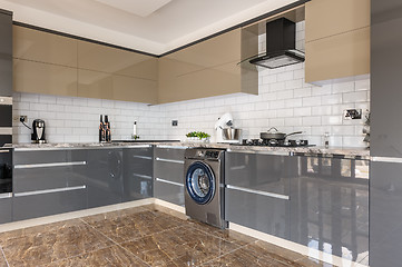 Image showing Luxury modern white, beige and grey kitchen interior