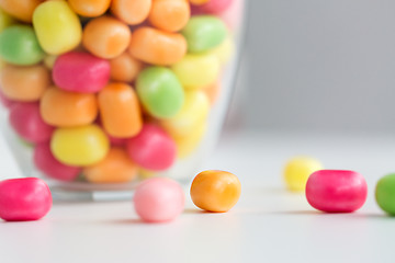 Image showing close up of colorful candy drops on table