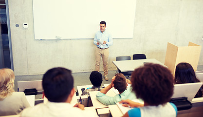 Image showing group of students and teacher at lecture