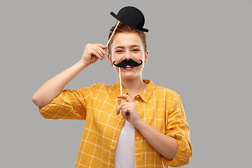 Image showing red haired teenage girl with black moustaches