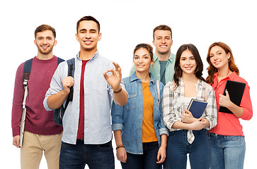 Image showing group of smiling students showing ok hand sign