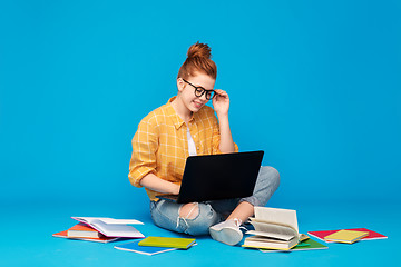 Image showing red haired teenage student girl with laptop