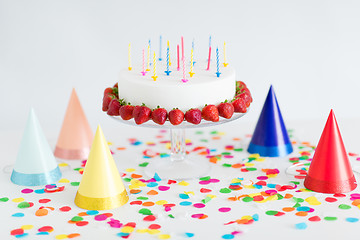 Image showing birthday cake with candles and strawberries