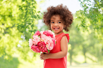 Image showing happy little african american girl with flowers