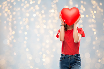 Image showing teenage girl with red heart shaped balloon