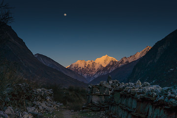 Image showing Langtang valley moonrise over mountain