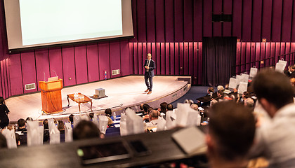 Image showing Speaker giving presentation on business conference event.