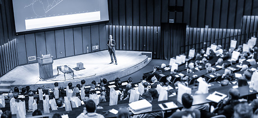 Image showing Speaker giving presentation on business conference event.