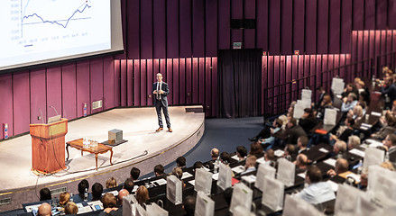 Image showing Speaker giving presentation on business conference event.