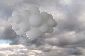 Image showing White helium balloons on a cloudy sky background.