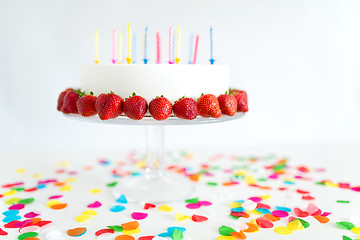 Image showing close up of birthday cake with candles on stand