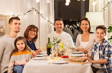 Image showing happy family having dinner party at home