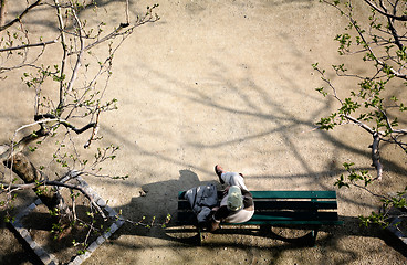 Image showing Thinking on a bench