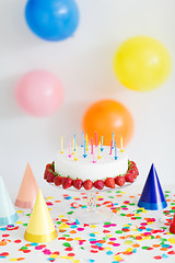 Image showing birthday cake with candles and strawberries