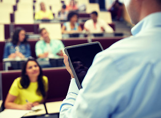 Image showing teacher with tablet pc and students at lecture