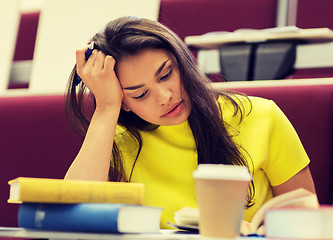 Image showing student girl with books and coffee on lecture