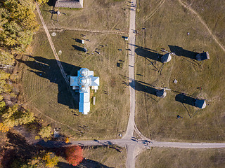 Image showing Aerial view from drone above old church and windmills.