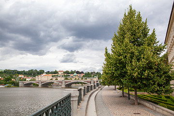 Image showing Cityscape of Prague with view of river and bridge, Czech Republic.