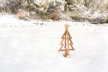 Image showing Little Christmas tree in fresh snowfall