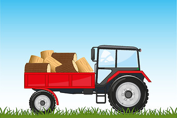 Image showing Tractor with basket ahead of laden firewood