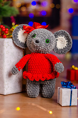 Image showing The plush mouse was given to children in the new year