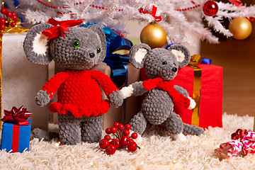 Image showing Two funny plush mice under the Christmas tree