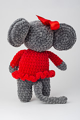 Image showing Plush mouse with a red bow on its head, Rear view