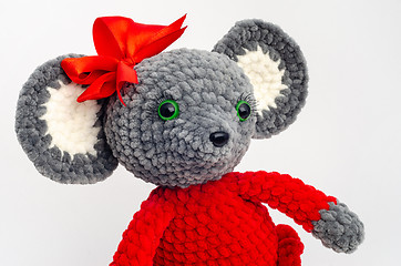 Image showing Portrait of a teddy mouse with a red bow on its head