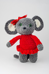 Image showing Plush mouse with a red bow on its head