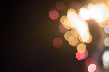 Image showing Defocused festive lights. Can be used as background