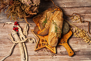 Image showing Bread On A Wooden Desk