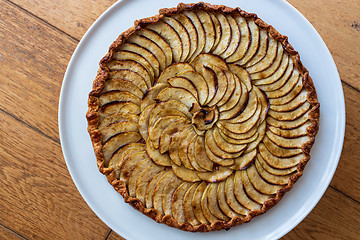 Image showing Traditional french apple tart over wood