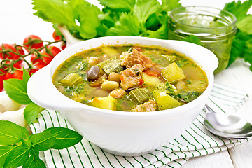 Image showing Soup with pisto sauce in bowl on white board