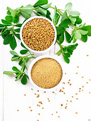 Image showing Fenugreek in two bowls with leaves on board top