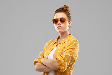 Image showing red haired teenage girl in sunglasses
