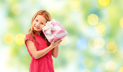 Image showing lovely red haired girl with birthday gift