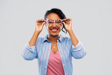 Image showing happy african american woman with big glasses