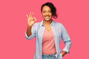 Image showing happy african american woman showing ok