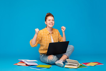 Image showing happy student girl with laptop celebrating success