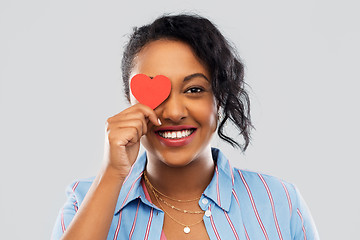 Image showing happy african american woman with red heart